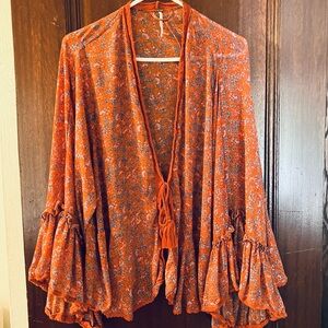 (SOLD) Free people bell-sleeved blouse. Size small.
